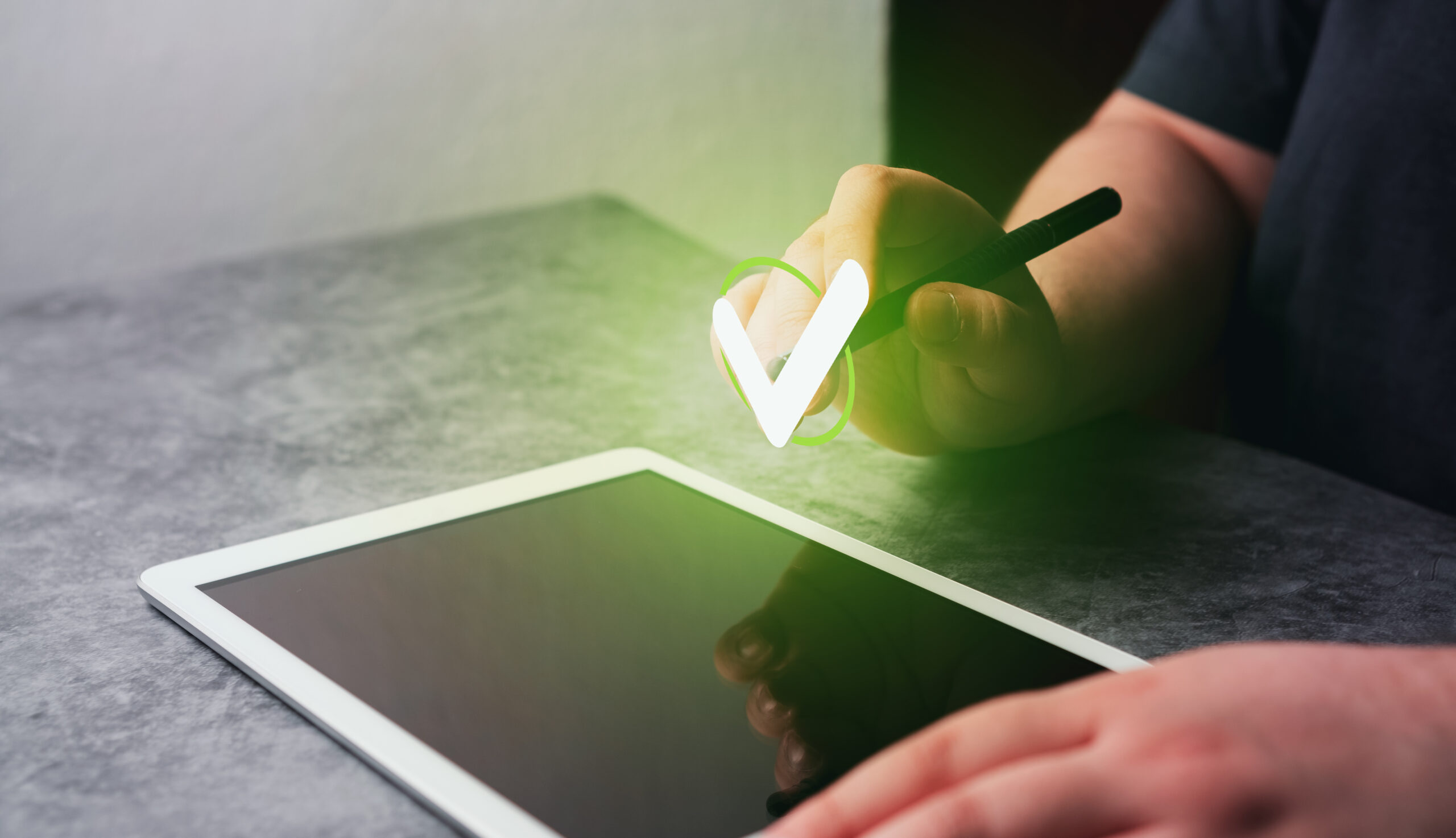 User applying a free Digital Signatures with a stylus on a tablet, showcasing the convenience of electronic mobile sign technology for digital approvals.