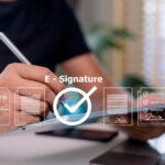 Person using a tablet to sign digital documents with an e-signature, representing modern online signing and secure electronic signature technology in 2025.