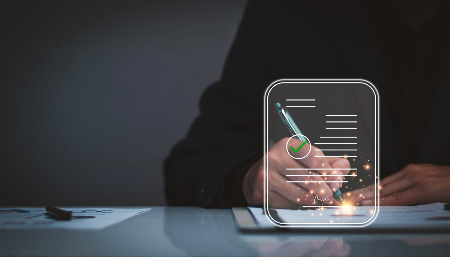 Business professional completing a secure digital signature on electronic documents, ensuring faster and compliant account opening for financial firms.