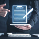 Business professional using a tablet for digital contract signing with e-signature technology — showcasing how SignBulb eSignature App helps close sales deals faster.