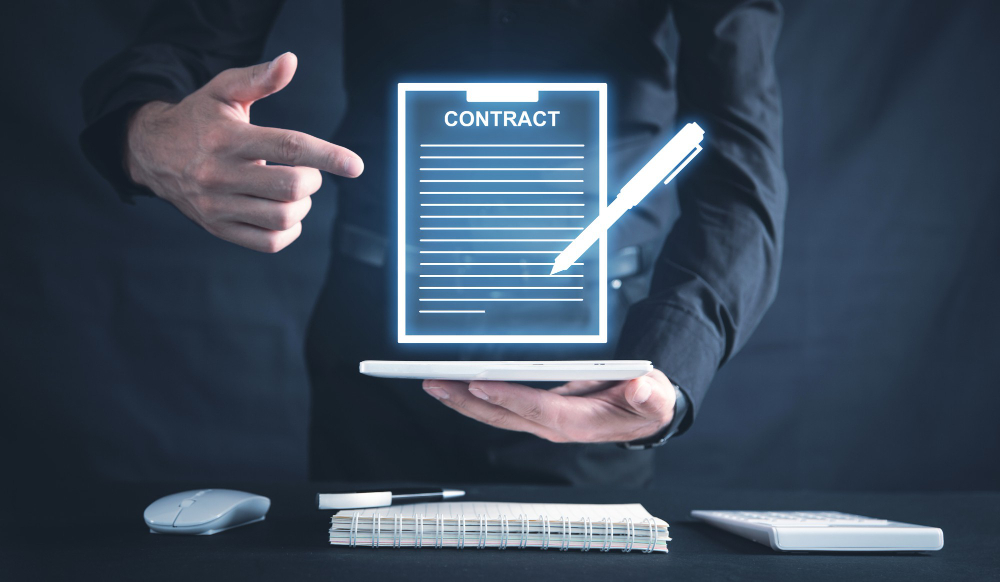 Business professional using a tablet for digital contract signing with e-signature technology — showcasing how SignBulb eSignature App helps close sales deals faster.